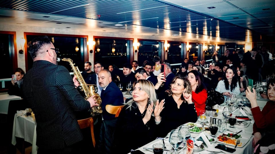 Bosphorus Dinner Cruise & Dance Shows with Private Table - Nighttime Views on the Bosphorus: Dolmabahçe, the Bridge, and Maiden’s Tower
